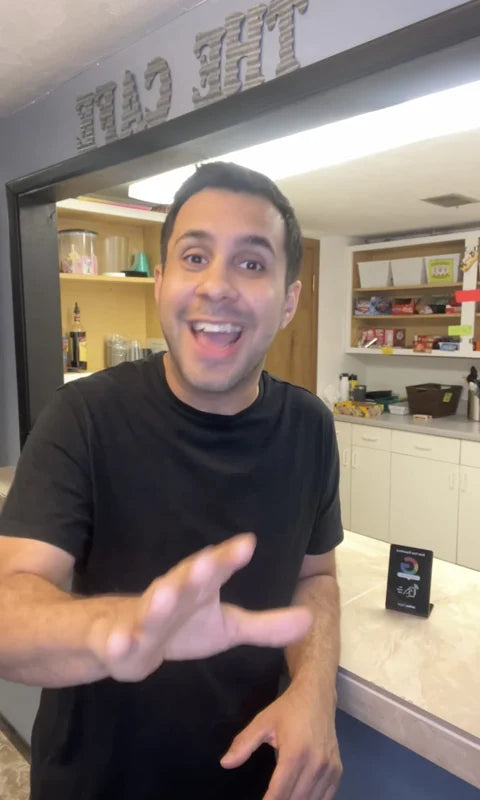 Steven Thompson, owner of Blackout Sports, in his store